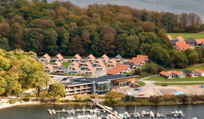 6 person holiday home on a holiday park in Gråsten