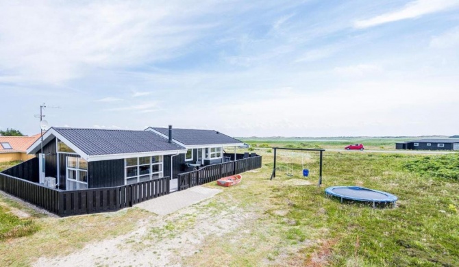 6 person holiday home on a holiday park in Hvide Sande