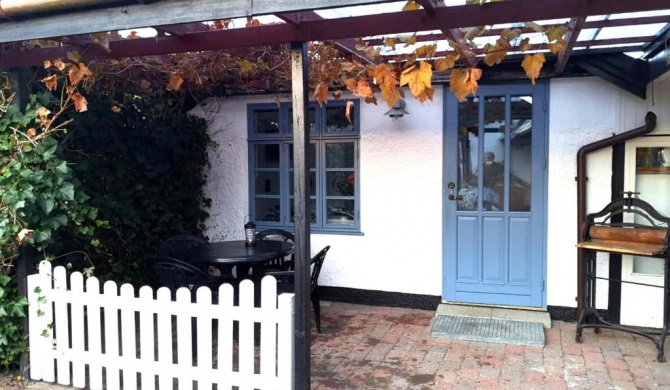 Cosy cottage in a garden